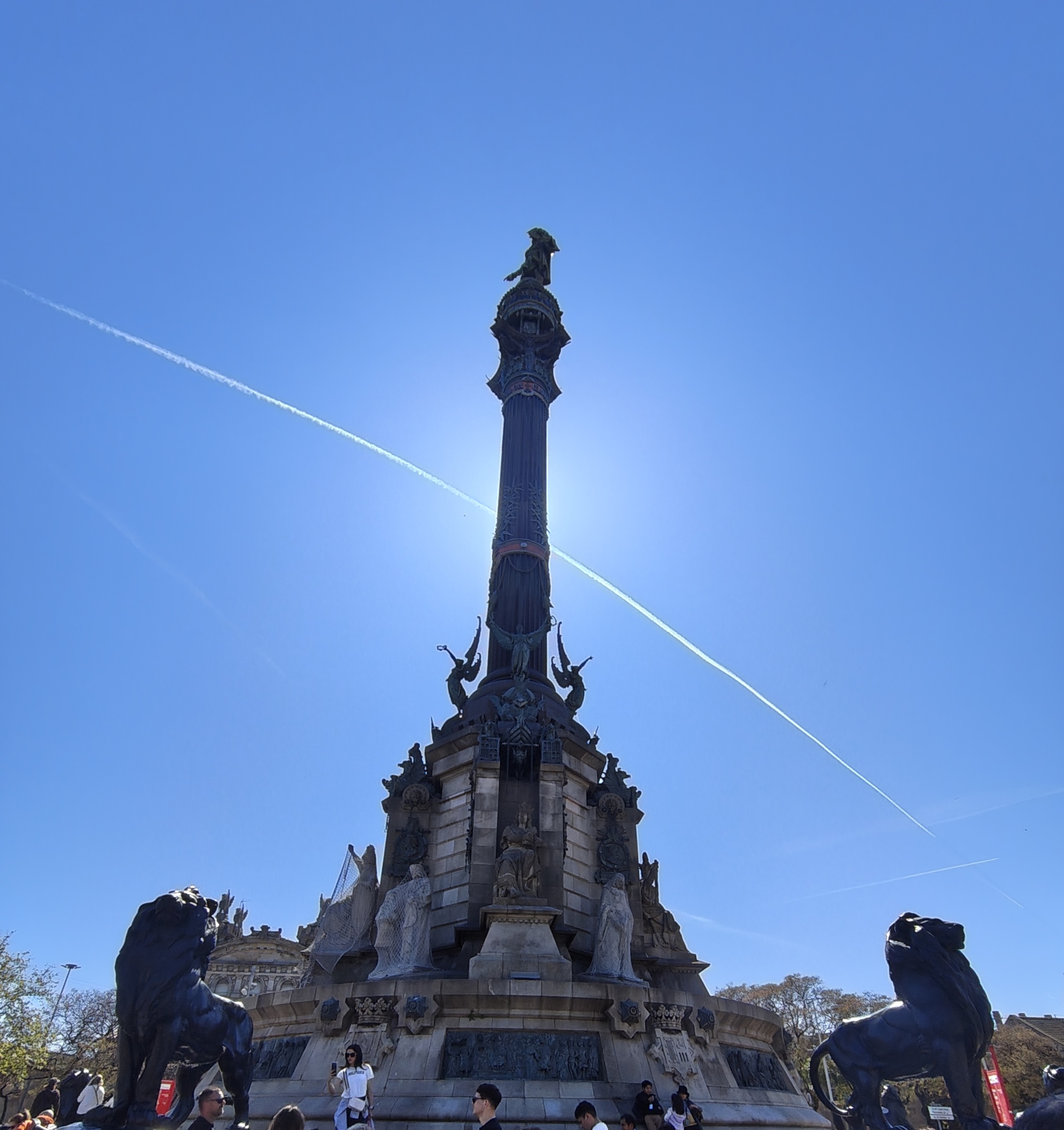 Tall pedestal with Christopher Columbus at the top pointing