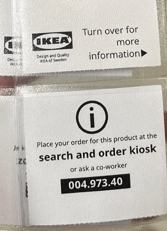 Product tag with article number asking to place the order at a search and order kiosk or to ask a co-worker